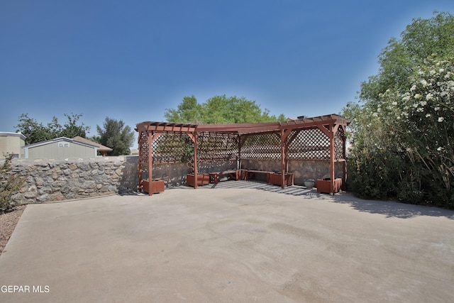 216 Desert Garden Dr, Santa Teresa, NM 88008 - view of patio with a pergola