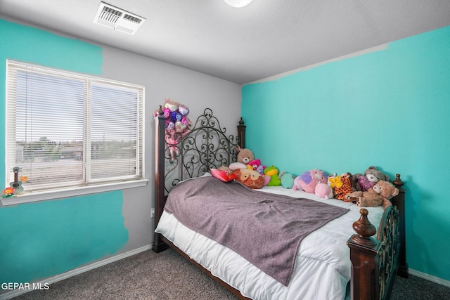 11562 Flor Gloriosa Dr, Socorro, TX 79927 - bedroom with carpet flooring and baseboards