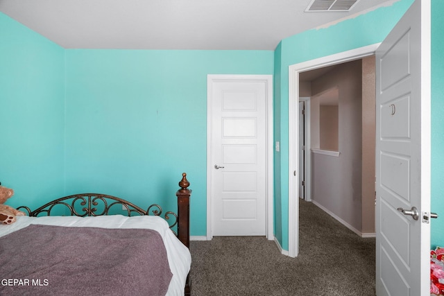 11562 Flor Gloriosa Dr, Socorro, TX 79927 - bedroom featuring dark colored carpet and baseboards
