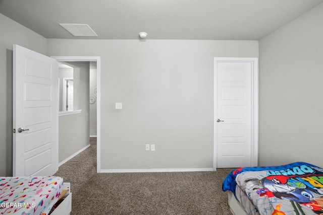 11562 Flor Gloriosa Dr, Socorro, TX 79927 - carpeted bedroom with baseboards
