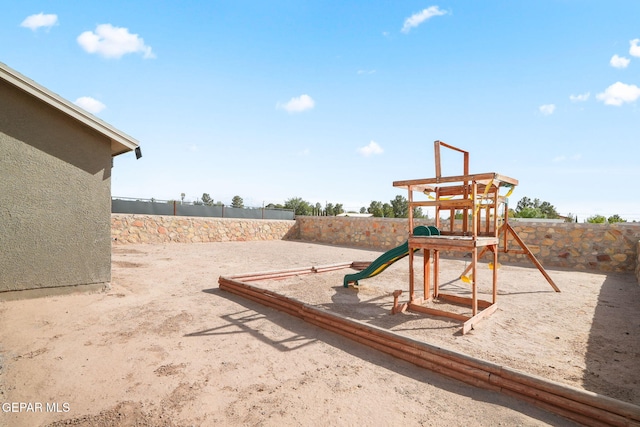 11562 Flor Gloriosa Dr, Socorro, TX 79927 - communal playground featuring a fenced backyard