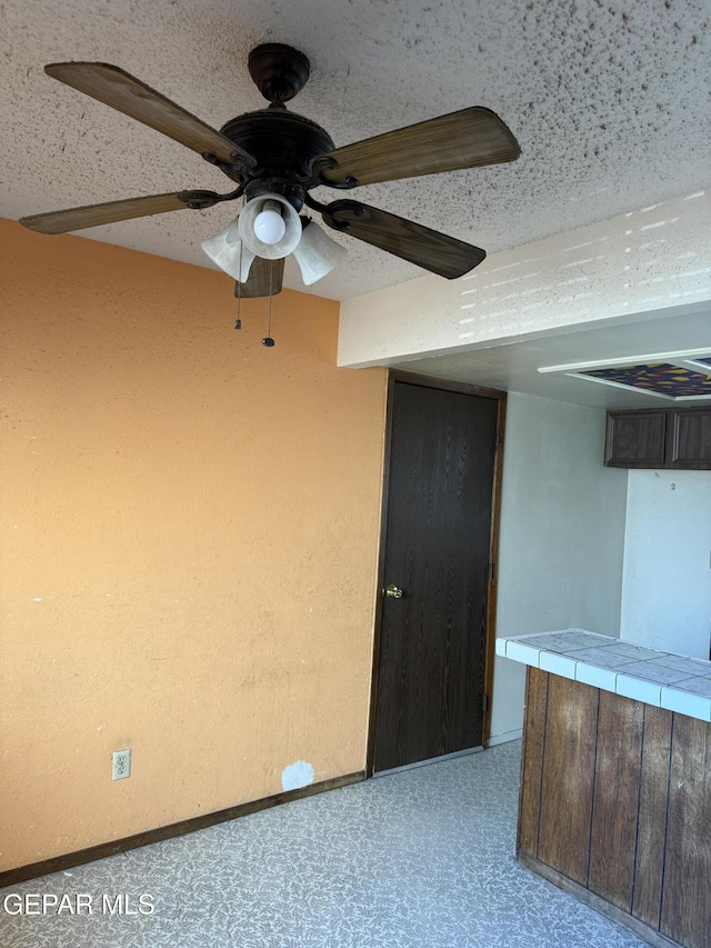 3910 Quasar Ct, El Paso, TX 79904 - spare room featuring baseboards and a ceiling fan