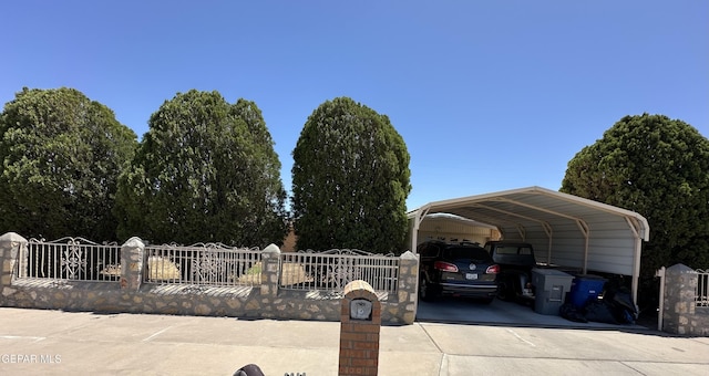 5028 Sagittarius Ave, El Paso, TX 79924 - view of car parking with a detached carport and driveway