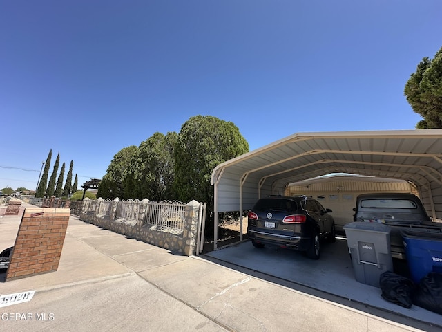 5028 Sagittarius Ave, El Paso, TX 79924 - view of car parking featuring a carport and driveway