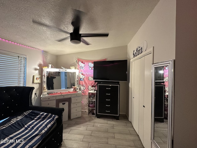 5028 Sagittarius Ave, El Paso, TX 79924 - bedroom featuring a textured ceiling and ceiling fan