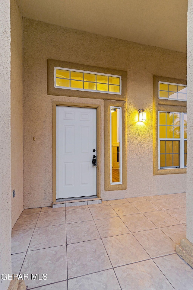 5965 Katelyn Gray Cir, El Paso, TX 79924 - view of exterior entry with stucco siding