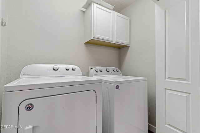 5965 Katelyn Gray Cir, El Paso, TX 79924 - laundry area with independent washer and dryer, cabinet space, and a textured wall