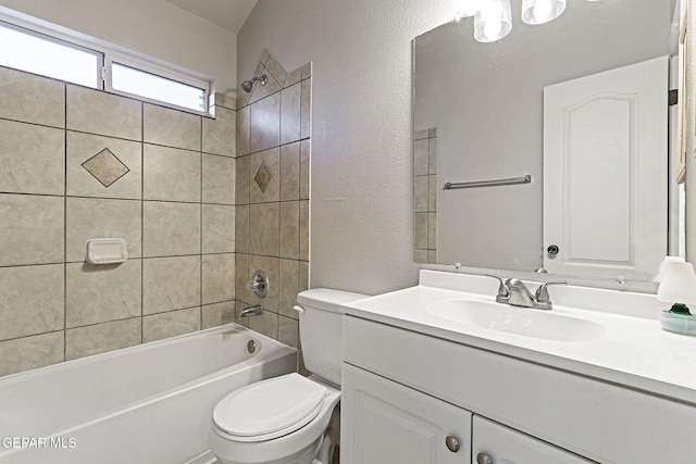 5965 Katelyn Gray Cir, El Paso, TX 79924 - full bath featuring toilet, vanity, a textured wall, and bathtub / shower combination