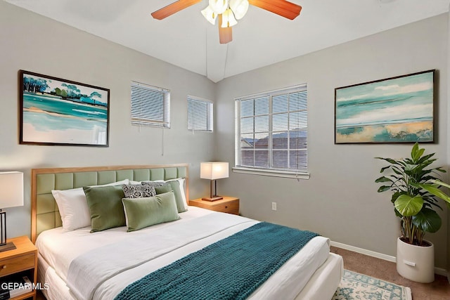 5965 Katelyn Gray Cir, El Paso, TX 79924 - carpeted bedroom featuring baseboards and a ceiling fan