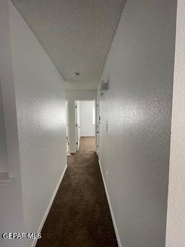 12501 Sombra Fuerte Dr, El Paso, TX 79938 - corridor featuring carpet floors and baseboards