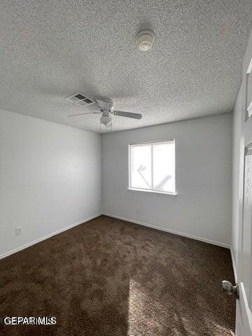 12501 Sombra Fuerte Dr, El Paso, TX 79938 - carpeted empty room featuring a ceiling fan, a textured ceiling, and baseboards