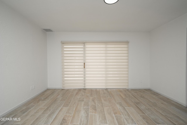 6608 Los Altos Dr, El Paso, TX 79912 - spare room with light wood-type flooring and baseboards