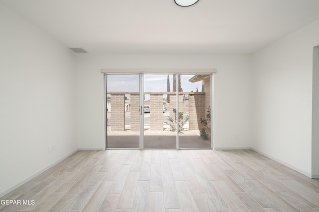 6608 Los Altos Dr, El Paso, TX 79912 - empty room with wood finished floors and baseboards