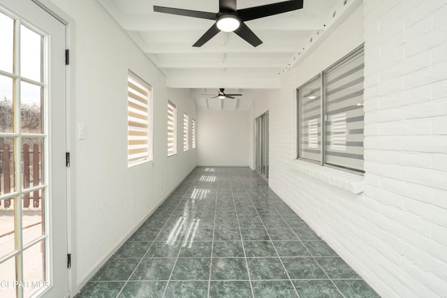 6608 Los Altos Dr, El Paso, TX 79912 - hallway featuring beamed ceiling and dark tile patterned flooring