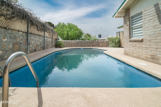 6608 Los Altos Dr, El Paso, TX 79912 - view of pool featuring a fenced backyard