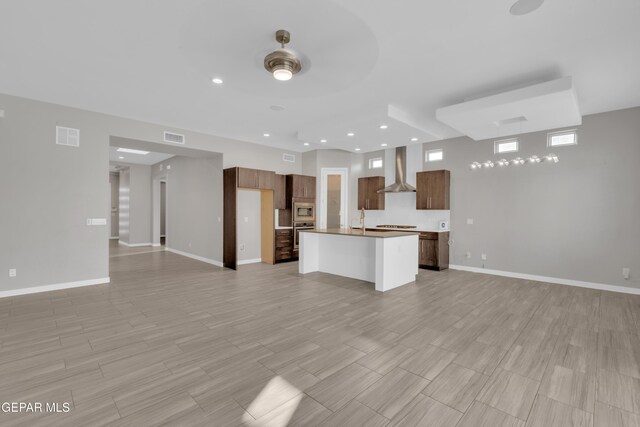2174 Enchanted Crest Dr, El Paso, TX 79911 - unfurnished living room with a sink, recessed lighting, baseboards, and a ceiling fan