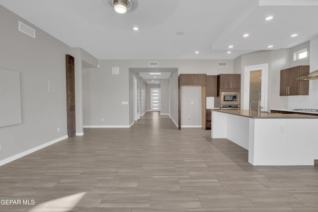 2174 Enchanted Crest Dr, El Paso, TX 79911 - kitchen featuring appliances with stainless steel finishes, recessed lighting, a ceiling fan, dark countertops, and open floor plan