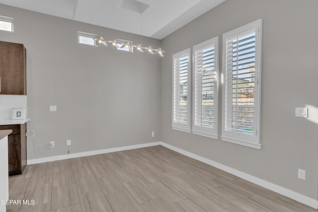 2174 Enchanted Crest Dr, El Paso, TX 79911 - unfurnished dining area featuring baseboards