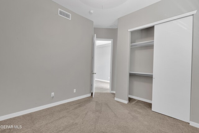 2174 Enchanted Crest Dr, El Paso, TX 79911 - unfurnished bedroom featuring carpet, a closet, and baseboards