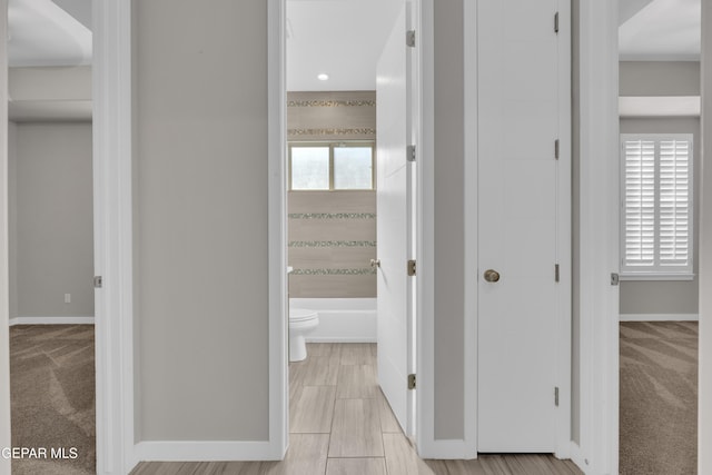 2174 Enchanted Crest Dr, El Paso, TX 79911 - hallway with baseboards, light colored carpet, and recessed lighting