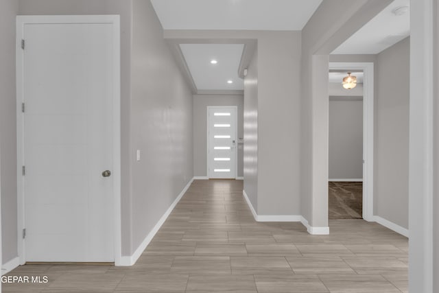 2174 Enchanted Crest Dr, El Paso, TX 79911 - hall with baseboards, recessed lighting, and wood tiled floors