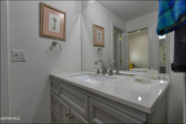 4490 Shadow Willow Dr, El Paso, TX 79922 - bathroom with vanity and a textured wall