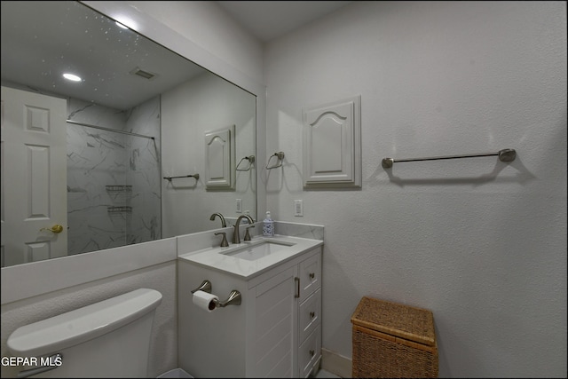 4490 Shadow Willow Dr, El Paso, TX 79922 - full bathroom featuring toilet, vanity, and a marble finish shower