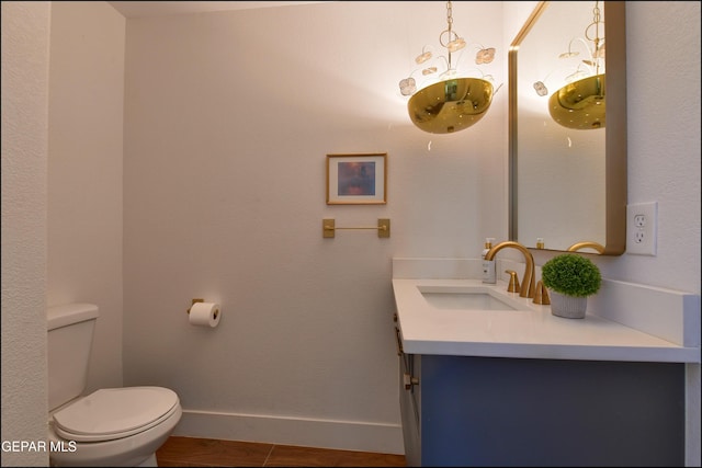 4490 Shadow Willow Dr, El Paso, TX 79922 - bathroom featuring vanity, toilet, and baseboards