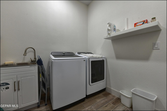 4490 Shadow Willow Dr, El Paso, TX 79922 - laundry area with washer and dryer, cabinet space, and dark wood finished floors