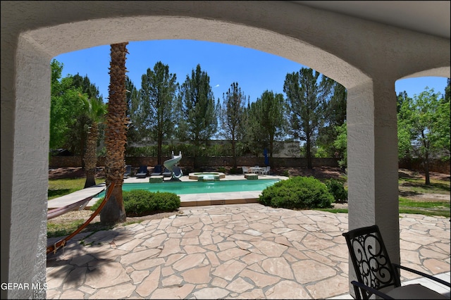 4490 Shadow Willow Dr, El Paso, TX 79922 - fenced backyard with a patio area and a pool with connected hot tub