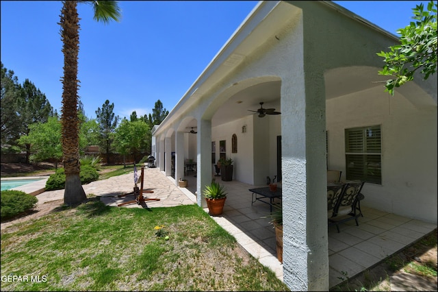 4490 Shadow Willow Dr, El Paso, TX 79922 - view of yard featuring ceiling fan and a patio