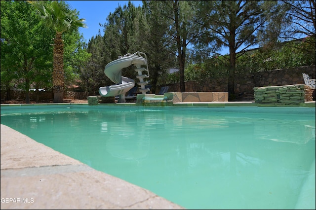 4490 Shadow Willow Dr, El Paso, TX 79922 - outdoor pool with a water slide
