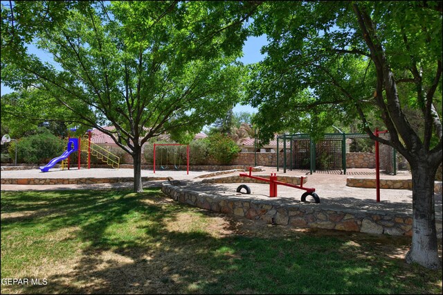 4490 Shadow Willow Dr, El Paso, TX 79922 - community jungle gym featuring a lawn