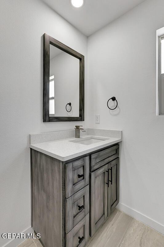 1107 Myrtle Ave A-D, Unit A-D, El Paso, TX 79901 - bathroom with baseboards and vanity