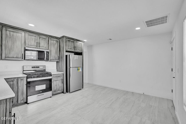 1107 Myrtle Ave A-D, Unit A-D, El Paso, TX 79901 - kitchen with appliances with stainless steel finishes, light countertops, and recessed lighting