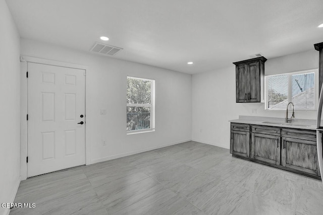 1107 Myrtle Ave A-D, Unit A-D, El Paso, TX 79901 - unfurnished living room with a sink, recessed lighting, and baseboards