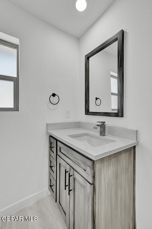 1107 Myrtle Ave A-D, Unit A-D, El Paso, TX 79901 - bathroom featuring vanity and baseboards
