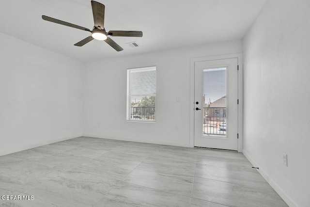 1107 Myrtle Ave A-D, Unit A-D, El Paso, TX 79901 - spare room with plenty of natural light, a ceiling fan, and baseboards