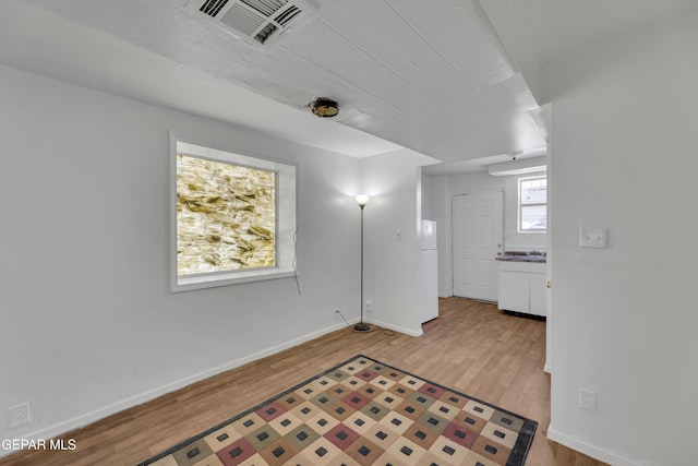 2312 Grant Ave, El Paso, TX 79930 - spare room with light wood finished floors and baseboards