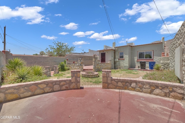 2312 Grant Ave, El Paso, TX 79930 - view of patio featuring an outdoor fire pit