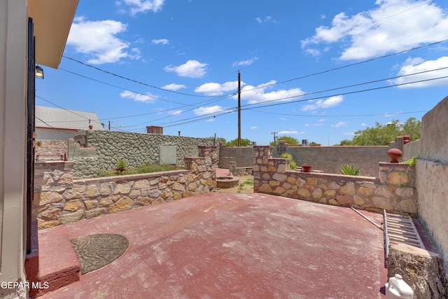 2312 Grant Ave, El Paso, TX 79930 - fenced backyard with a patio area