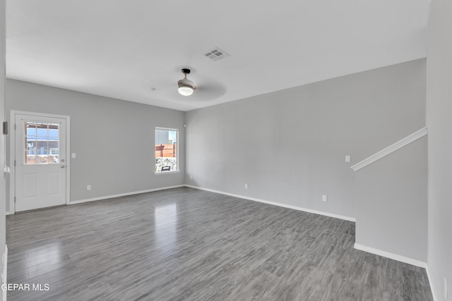 14378 N Cave Dr, El Paso, TX 79938 - spare room featuring ceiling fan, wood finished floors, and baseboards
