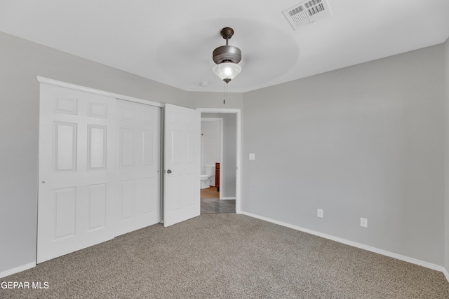 14378 N Cave Dr, El Paso, TX 79938 - unfurnished bedroom featuring carpet floors, a closet, baseboards, and ceiling fan