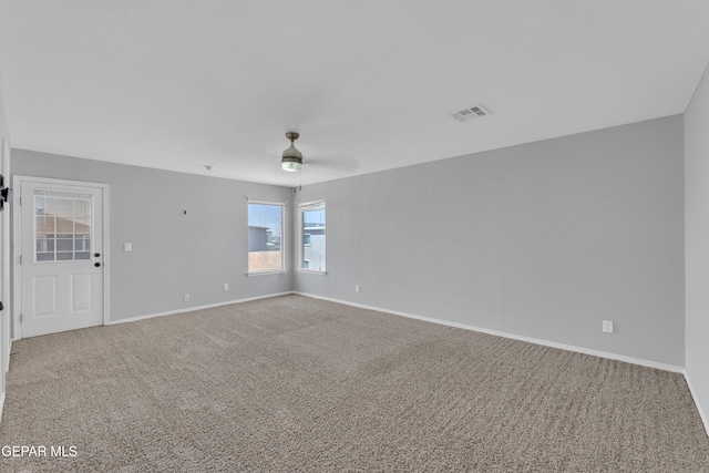 14378 N Cave Dr, El Paso, TX 79938 - unfurnished room with carpet flooring, a ceiling fan, and baseboards