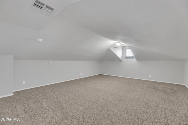 14378 N Cave Dr, El Paso, TX 79938 - additional living space featuring carpet flooring, lofted ceiling, and baseboards