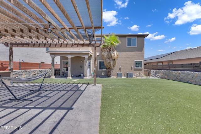 14378 N Cave Dr, El Paso, TX 79938 - back of property with a patio area, a pergola, stucco siding, and central air condition unit