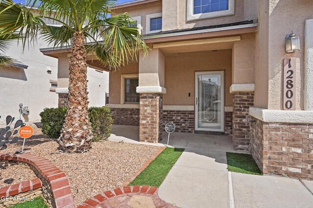 12800 Tierra Alexis Dr, El Paso, TX 79938 - property entrance with stucco siding and brick siding