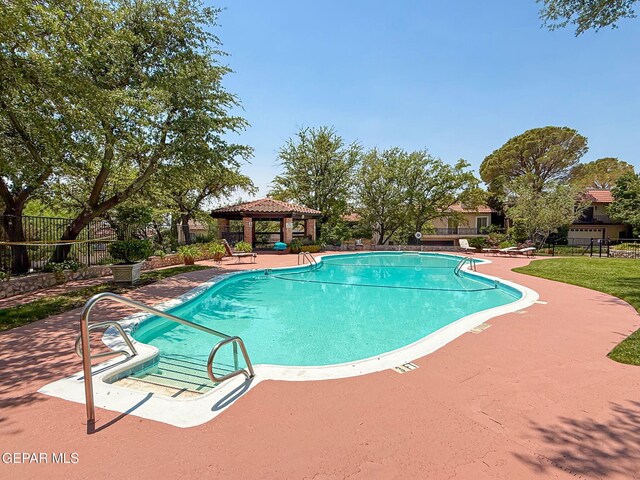 6006 Balcones Ct Unit 19, El Paso, TX 79912 - community pool featuring a gazebo and a patio area