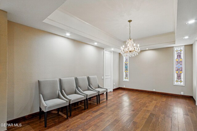 6006 Balcones Ct Unit 19, El Paso, TX 79912 - sitting room featuring wood-type flooring, a tray ceiling, recessed lighting, a chandelier, and baseboards
