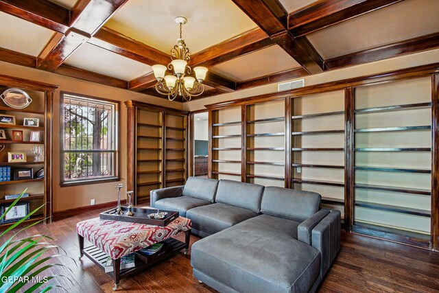 6006 Balcones Ct Unit 19, El Paso, TX 79912 - living room featuring coffered ceiling, baseboards, dark wood-style floors, beam ceiling, and a chandelier